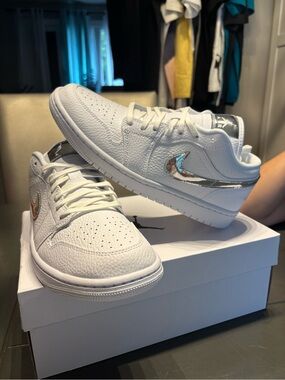 Nike Women’s White Low-Top Sneakers with Metallic Silver Swoosh